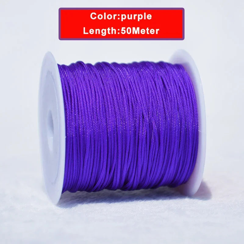 Purple nylon knotting cord with a white spool, 50 meters long.
