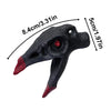A black ceramic Aztec skull whistle with red accents, shown from the side.