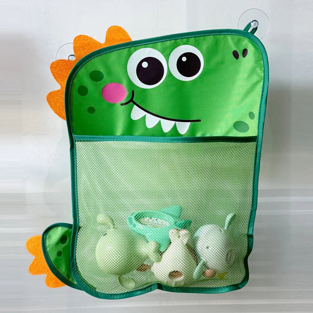A bright green frog-shaped storage bag with a suction cup, holding small white duck toys.