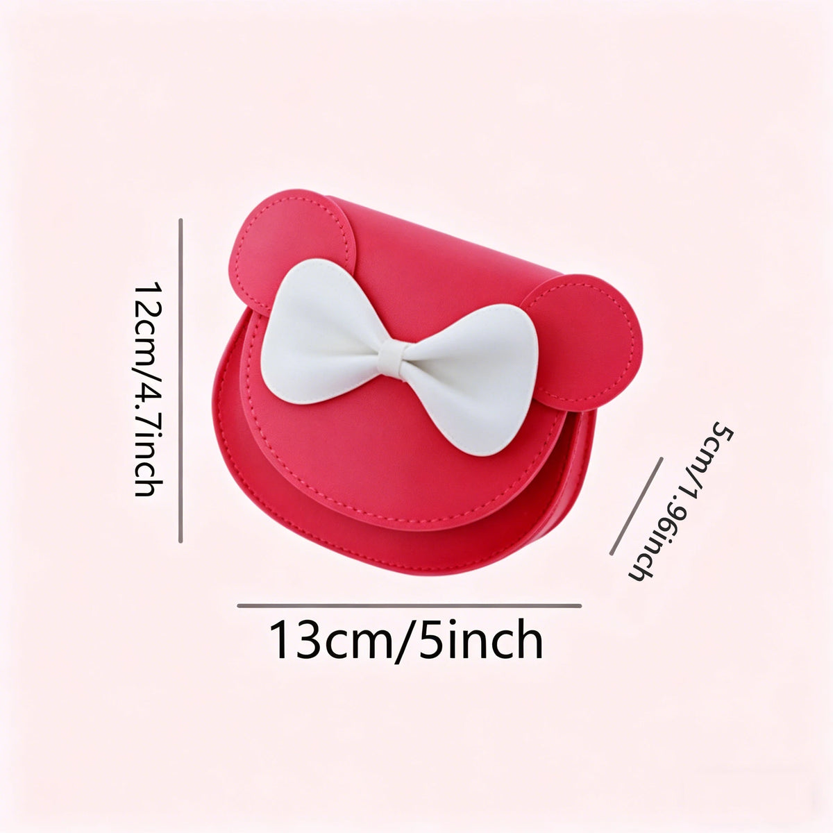 A red hard shell crossbody bag for kids featuring mouse ears and a white bow.