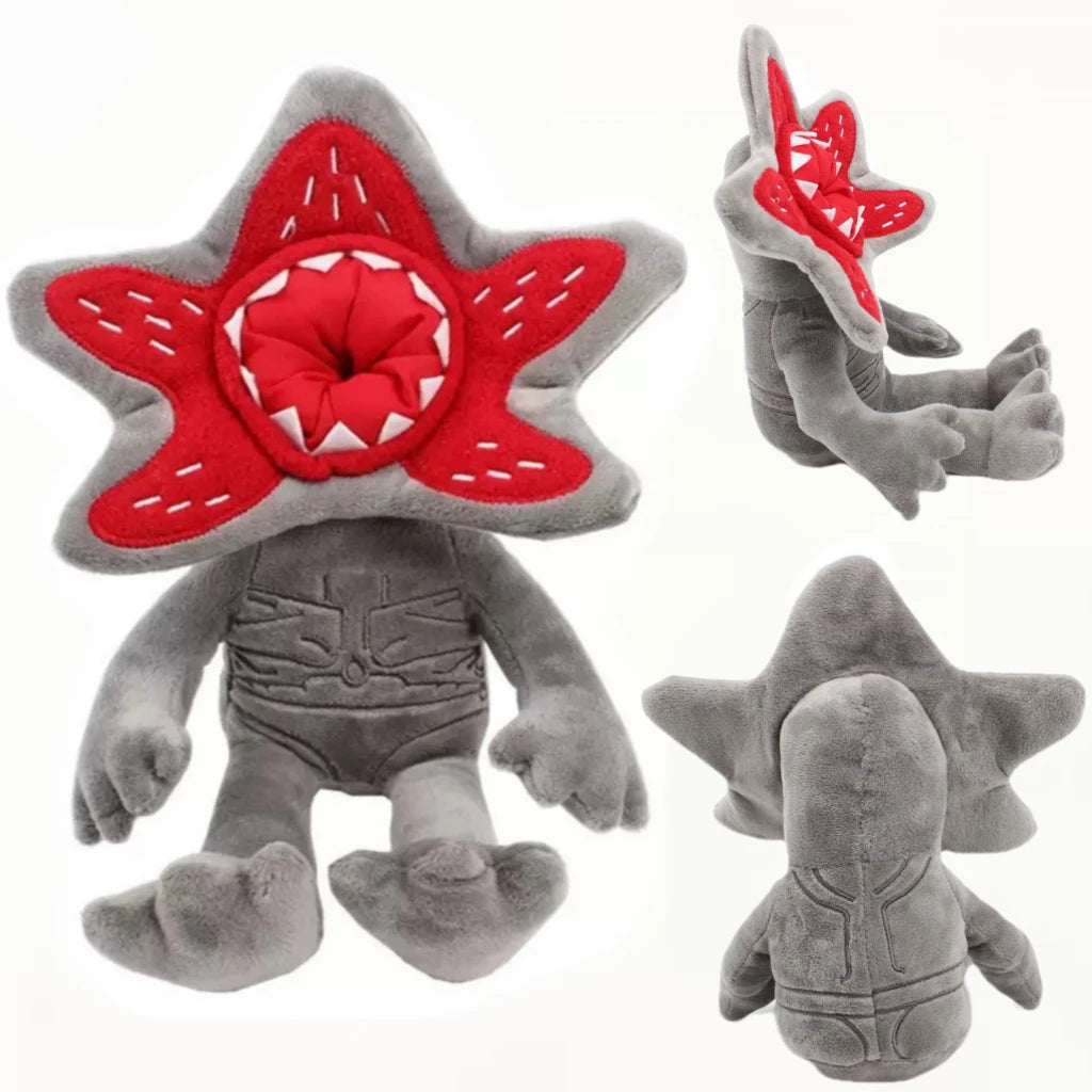 A plush doll set featuring Eleven, Mike, and the Demogorgon characters from Stranger Things.