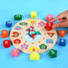 A hand is placing a red piece onto a wooden number and shape sorting clock with various colored wooden pieces scattered aroun