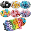 A collection of colorful rhinestone acrylic beads in various shades including black, yellow, pink, blue, and purple.