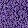 A close-up view of a large pack of purple pony beads for jewelry making and craft projects.