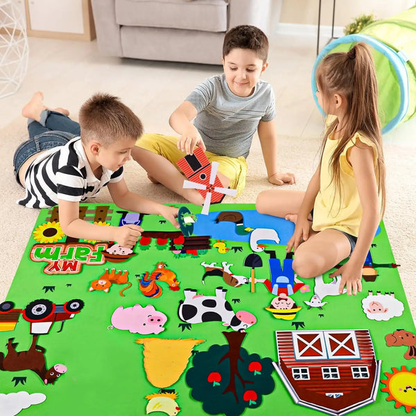 A family is playing with a green felt story board featuring various farm animals and elements for children.