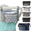 A gray stroller organizer bag with multiple pockets and hanging hooks is shown on a stroller handlebar.