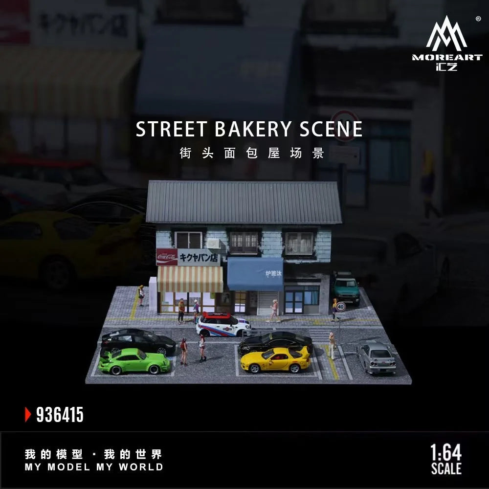 A 1:64 scale diorama depicting a street bakery scene with several diecast cars.