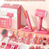 A pink children's hairdressing set featuring a blow dryer, scissors, combs, and styling tools for role-play.