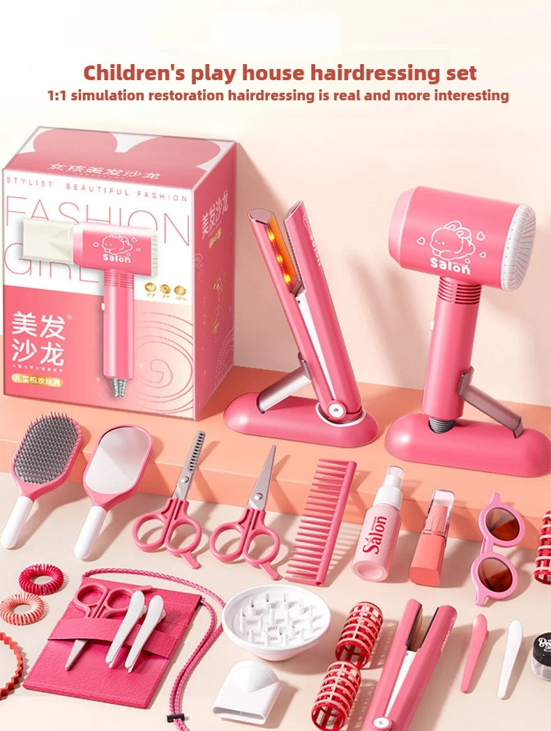 A pink children's hairdressing set featuring a blow dryer, scissors, combs, and styling tools for role-play.