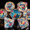 A collection of translucent, faceted polyhedral dice in various colors and patterns, including red and blue accents.