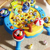 A colorful magnetic fishing game featuring a yellow and blue board with various plastic fish and fishing rods.