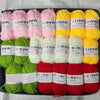 A pack of various colored yarn skeins including pink, yellow, green, and red acrylic wool for crafting.