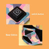 Close-up view of a pink and blue patterned fabric with a black switch button and a velcro base