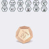 A wooden die showing a hiking icon, part of a couple's food decision dice set.