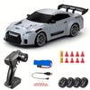A silver 4WD RC drift car with black accents and LED lights, shown next to its accessories.