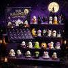 A dark purple Halloween advent calendar box featuring 24 spooky resin ornaments and a full moon backdrop.