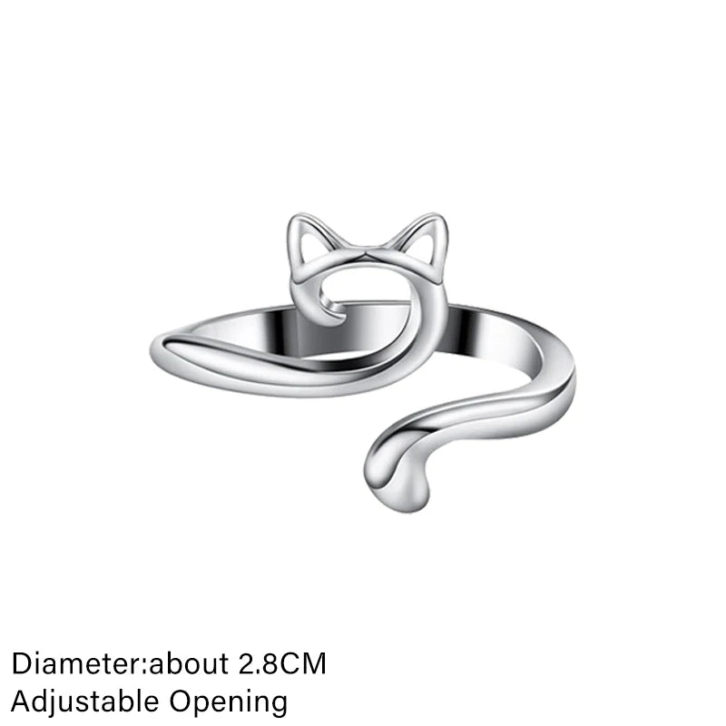 Silver adjustable cat-ear crochet ring with a curved design