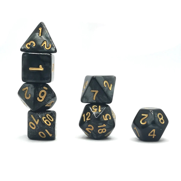 A set of seven polyhedral dice, including a d4, d6, d8, d10, d12, and d20, stacked and separate.
