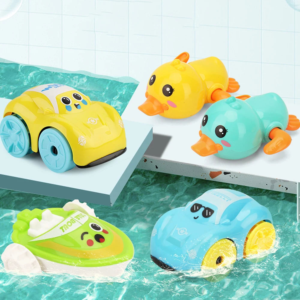 A set of yellow and blue duck bath toys floating in water.