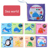 A set of soft fabric baby books featuring sea animals like sharks, whales, dolphins, fish, penguins, and turtles.