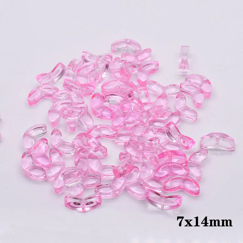 A pile of pink glass beads shaped like tulip flowers, measuring 7x14mm.