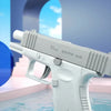 A white pistol-like device is shown floating in water, with a blue arched background.