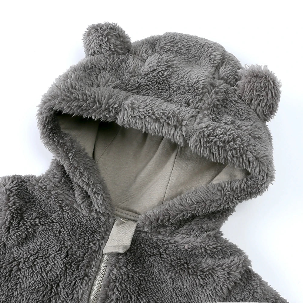 A close-up of a gray baby bear fleece hooded romper with a zipper.