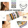 Various strands of green, purple, and amber gemstone beads for jewelry making projects