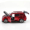 A red die-cast SUV toy with opening doors and pull-back action.