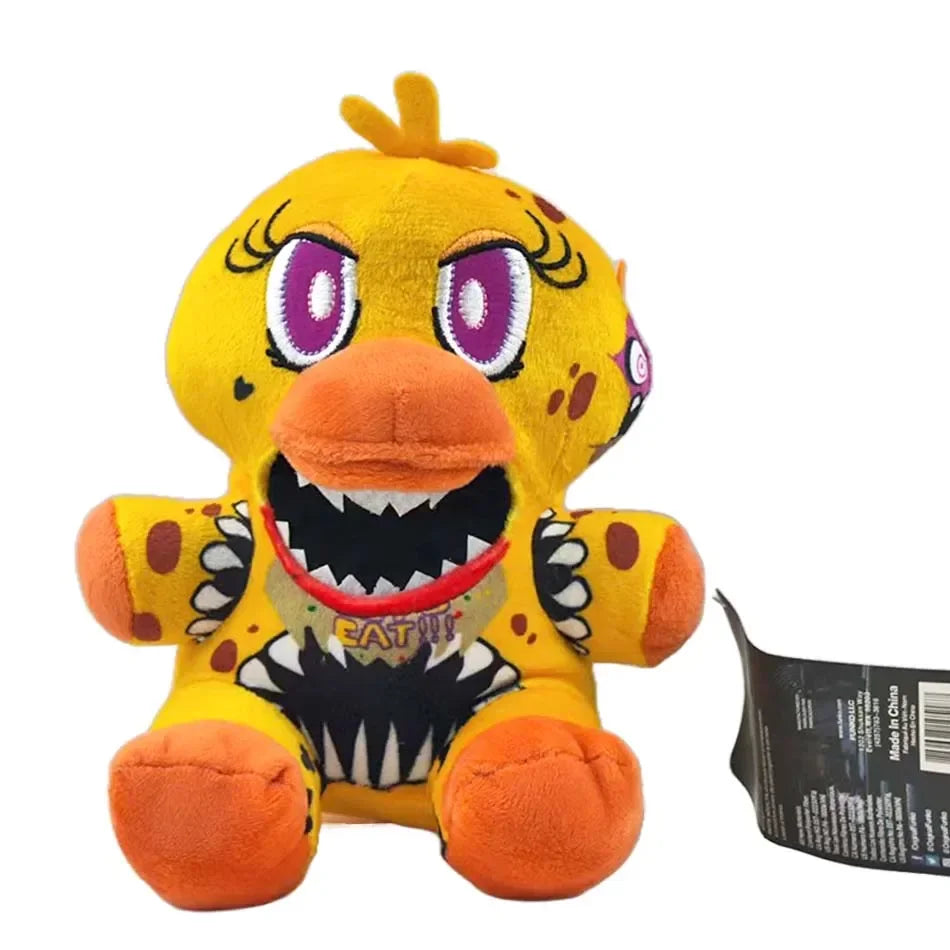 A yellow plush toy resembling a cartoon bird with large purple eyes and an orange beak.