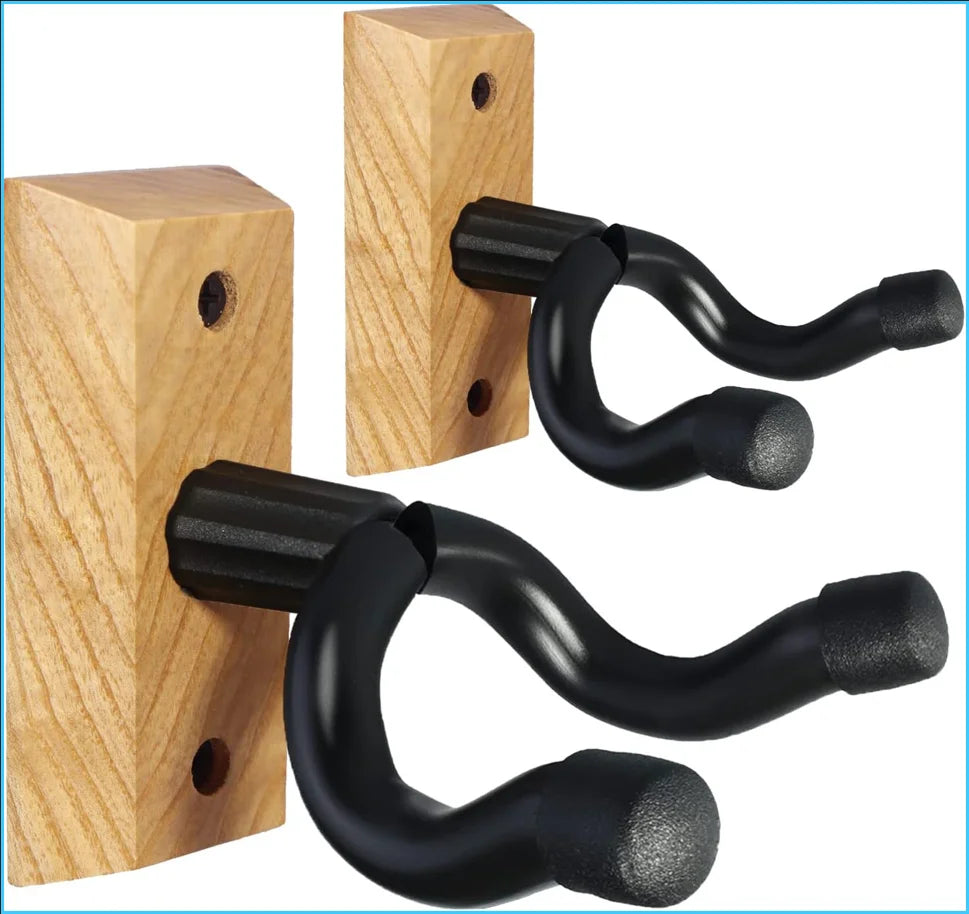 A solid wood guitar wall mount hanger with black, curved hooks for hanging instruments.