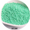 A pile of light green seed beads is shown in a white bowl.