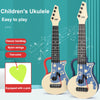 Two light-colored ukuleles with red and blue necks and bodies, shown against a teal background.