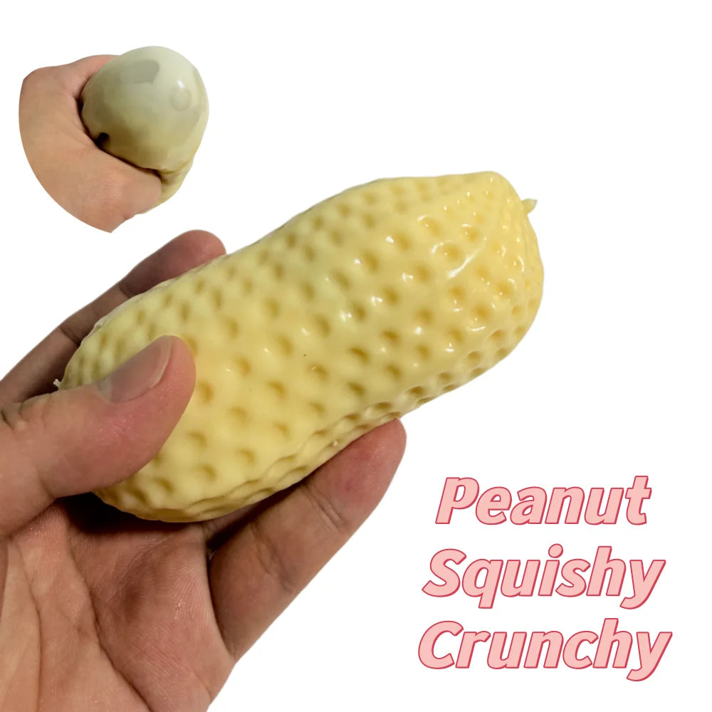 A hand holds a yellow squishy stress ball next to a small, round version.