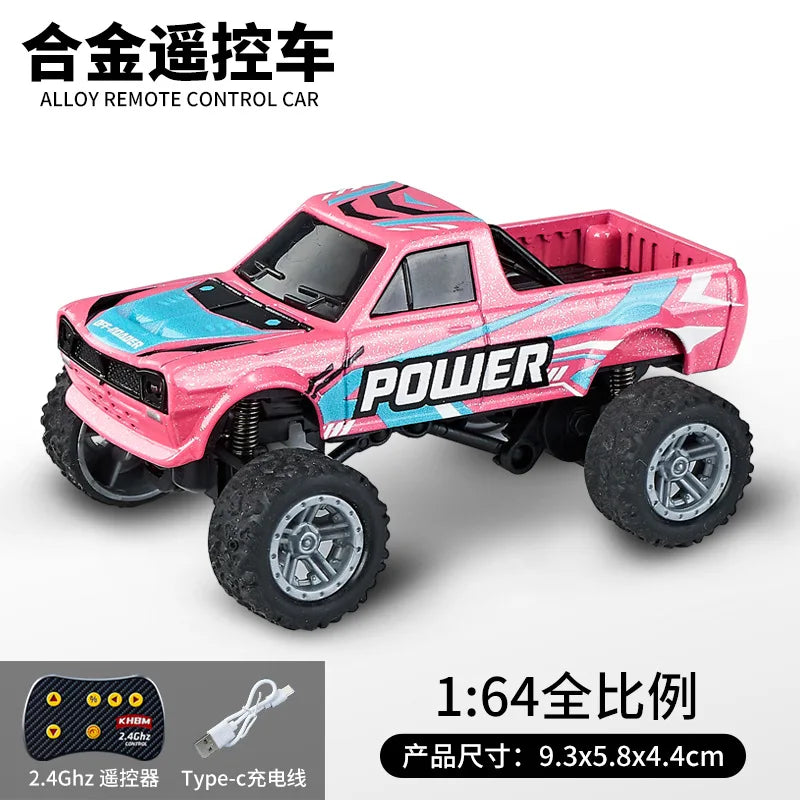 Pink and black 1:64 alloy remote control monster truck with large tires and a pickup bed