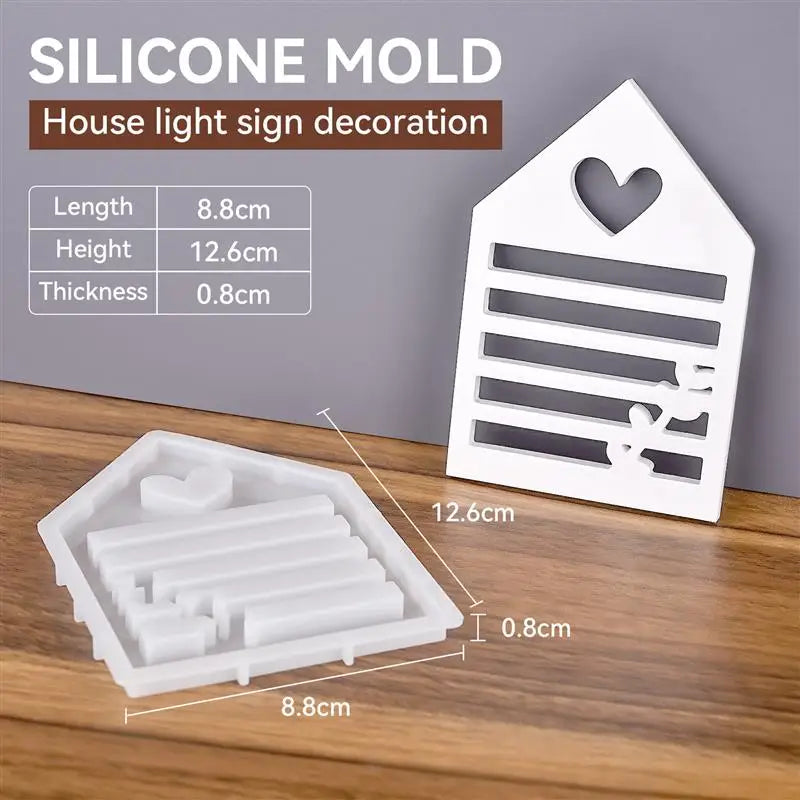 A white silicone mold set for making house light sign decorations, showing the mold and finished product.