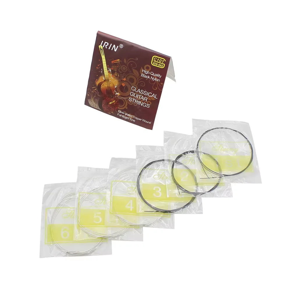 A set of classical guitar strings including clear nylon and silver-plated copper wound strings packaged in individual plastic