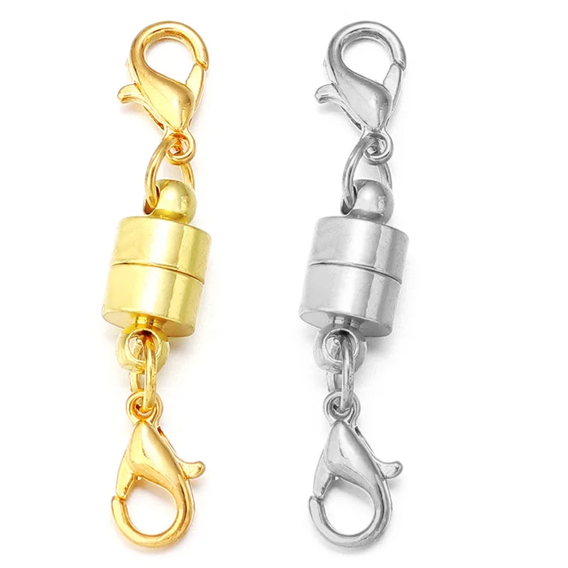 A pair of gold and silver magnetic clasps for jewelry making, showing various metal connectors.