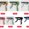 A collection of various colored aluminium alloy quick-release guitar caps shown in different angles.
