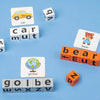 A wooden word spelling game featuring letter blocks and cards for learning words like car, mut, bear, and globe.