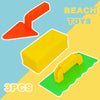 A set of three orange and yellow beach toys, including a mold kit for making sand and snow creations.