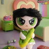 A collectible figure of Blossom from The Powerpuff Girls, featuring black hair and green eyes, displayed in a studio setting.