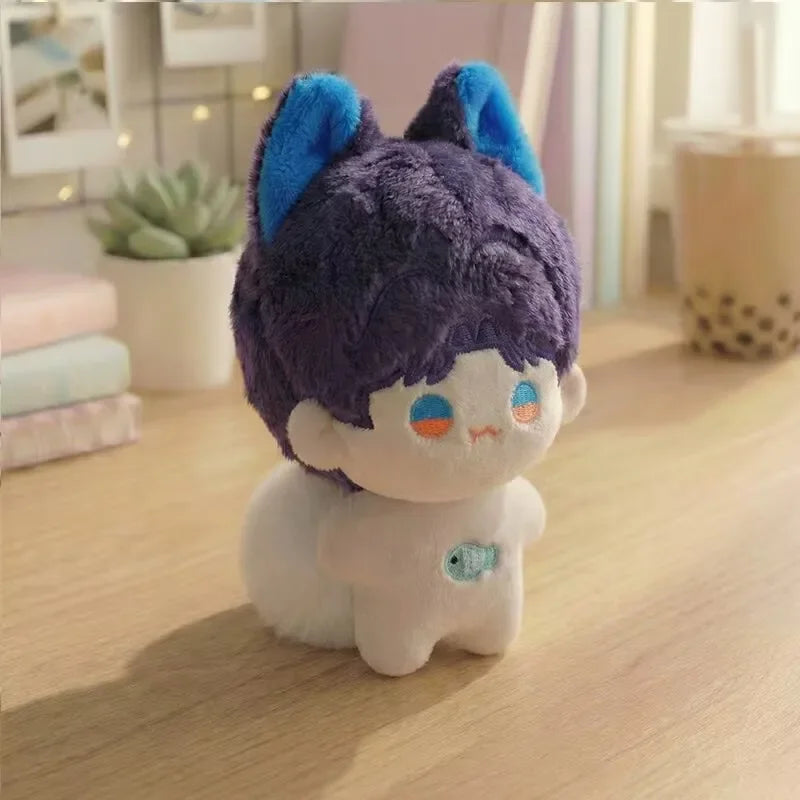 A purple and blue anime plush character with large ears sitting on a wooden surface.