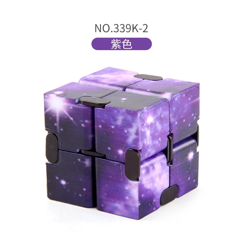A purple starry sky fidget cube with black accents.
