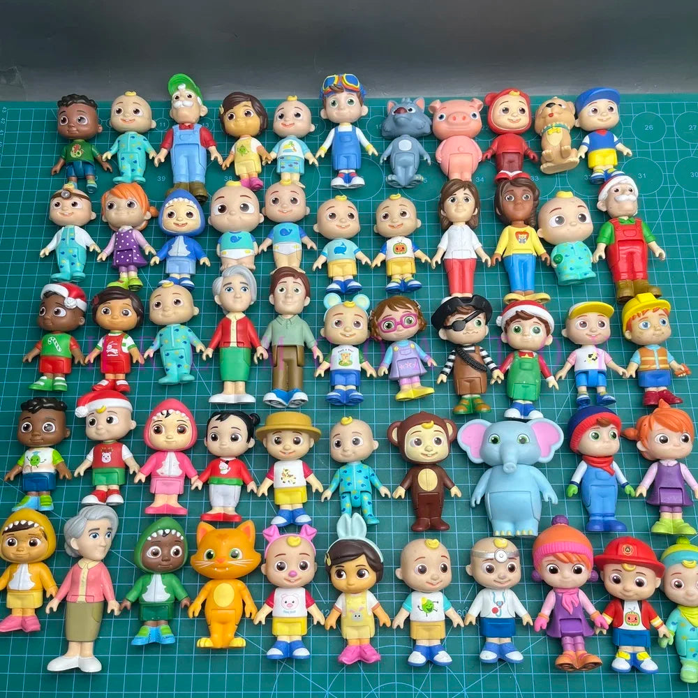 A collection of colorful PVC figurines depicting characters from a playful cartoon theme.