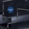 A black low profile microphone arm with cable management and an extended riser mounted on a dark surface.