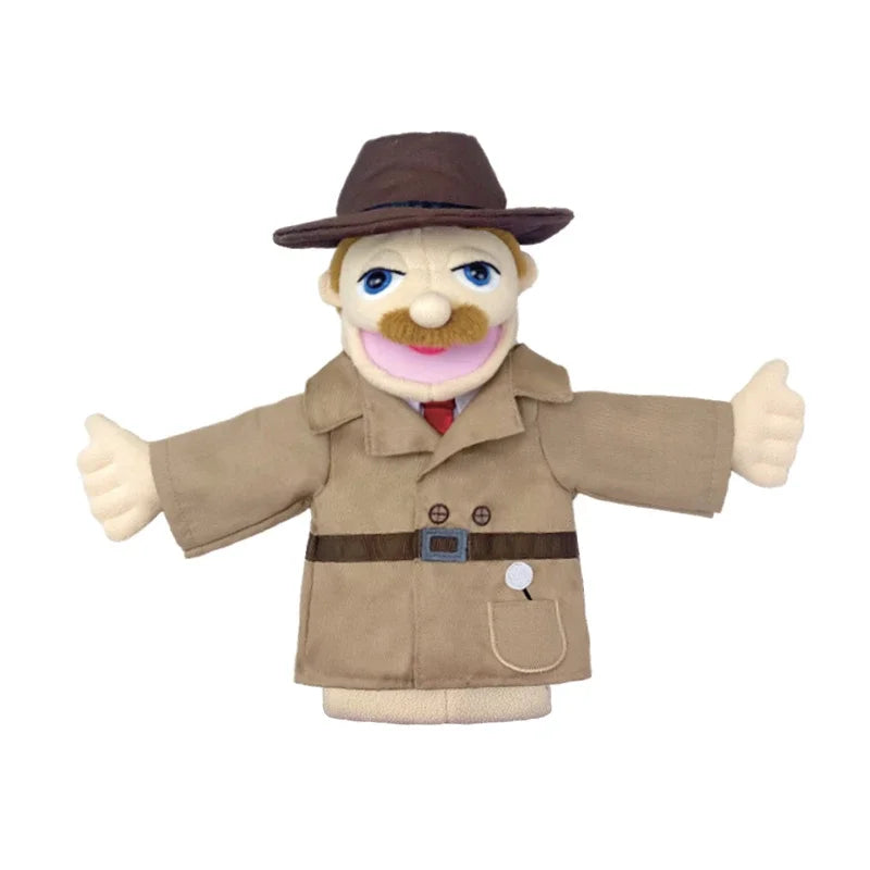A plush hand puppet of a man wearing a brown hat and a tan coat with a red tie.