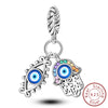 Sterling silver charm beads set featuring cross, angel, and evil eye designs for DIY jewelry making