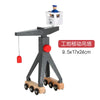 A wooden train track accessory set featuring an airport and gas station scene with a minifigure.