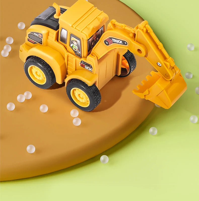 Modèle d'excavatrice de construction en métal jaune sur une surface marron avec de petites sphères blanches éparpillées.